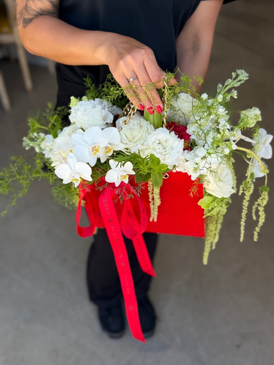 Red base Designer Floral Purse with a light floral palette
