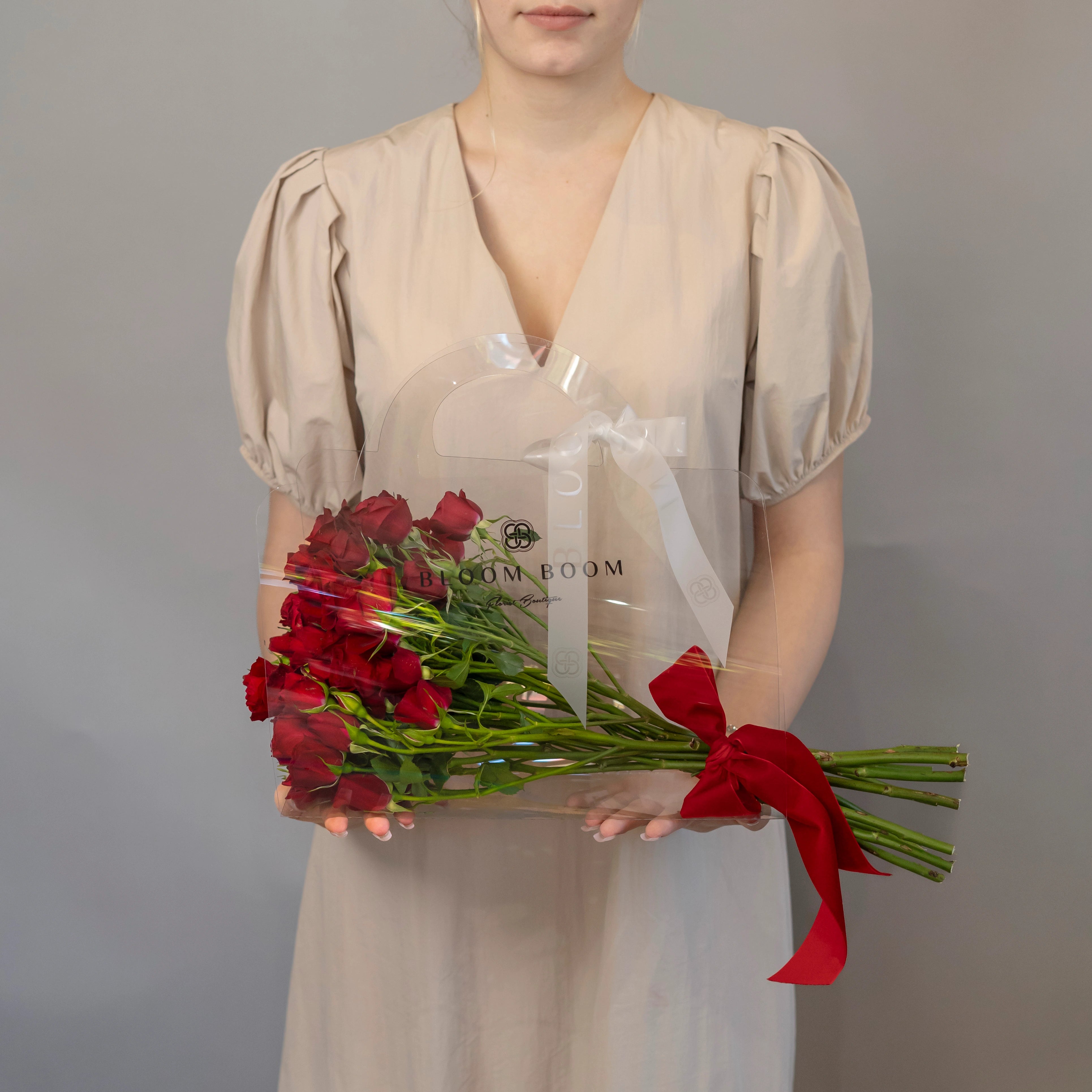 Red spray roses bouquet with red ribbon bow from Bloom Boom Flowers Los Angeles florist delivery service